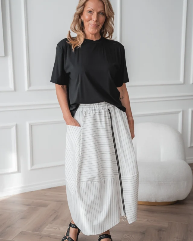 White doesn't have to be romantic or delicate.  Sometimes all you need is white, black and one good detail. Stripes, a visible zipper and an easy silhouette make this our kind of white. 🤍  Just add black T-shirt.
justmust.eu 
 #blackandwhiteonly #scandistyle #naturallyyou #effortlesselegance #boldandedgy #estoniandesign #justmustbyewi #fashionintallinn